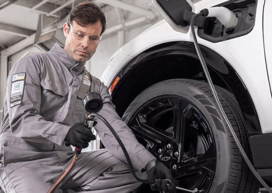 A Certified technician conducting a Vehicle Health Check.
