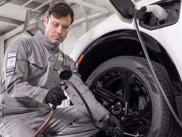 A Certified technician conducting a Vehicle Health Check.