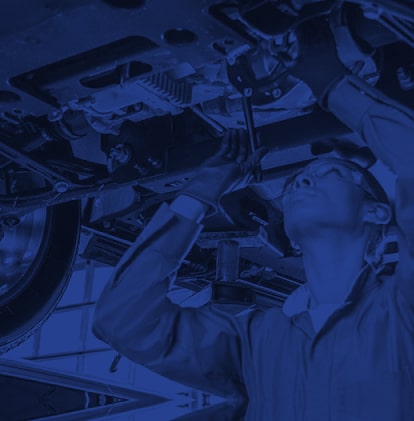 Certified technician working on a Vehicle Health Check.